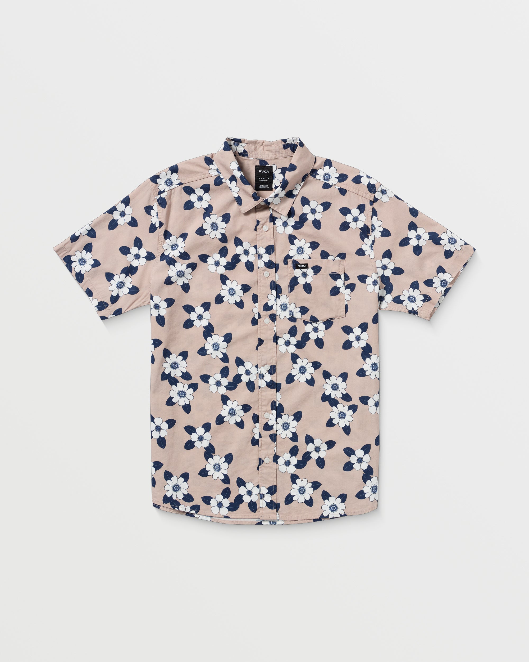 The Botanical Short Sleeve Shirt features a light pink base with a striking navy blue and white floral pattern, shown laid flat on a white background.